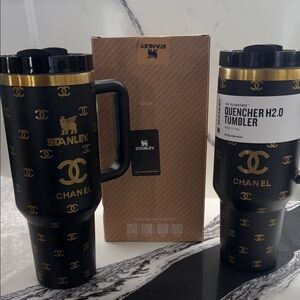 Stanley Black tumbler with God Chanel Logo,